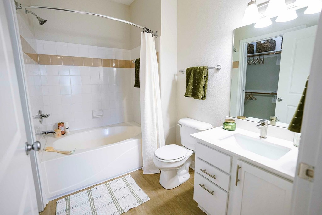 our apartments have a pool and a patio with chairs