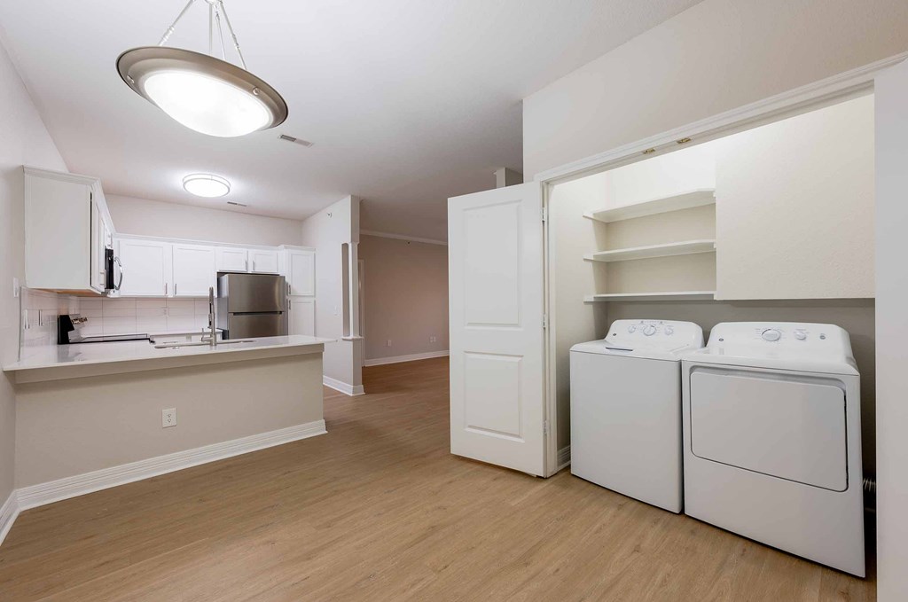 A laundry room with a washer and dryer.