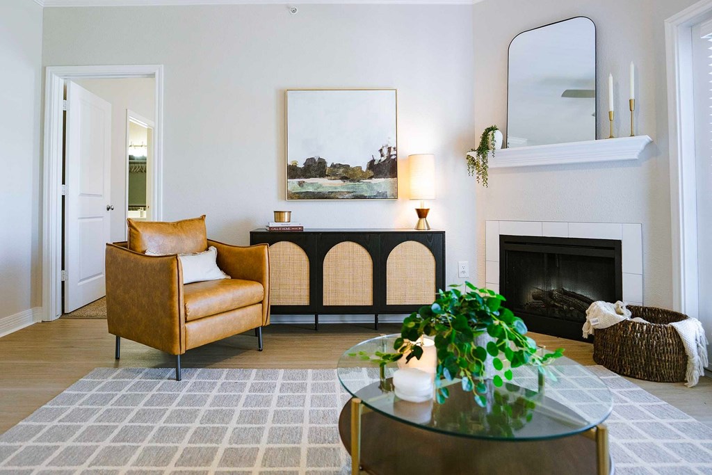 A white bathroom with a tub, toilet, and sink.