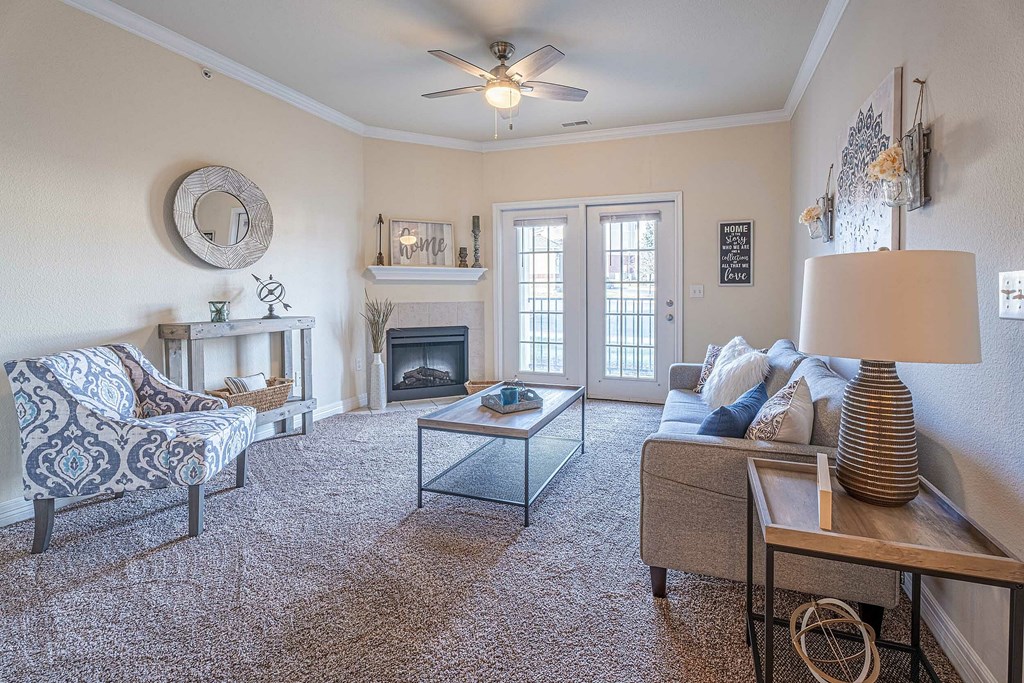 a fitness room with weights and mirrors and a large mirror