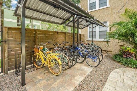 a group of bikes parked in front of a building