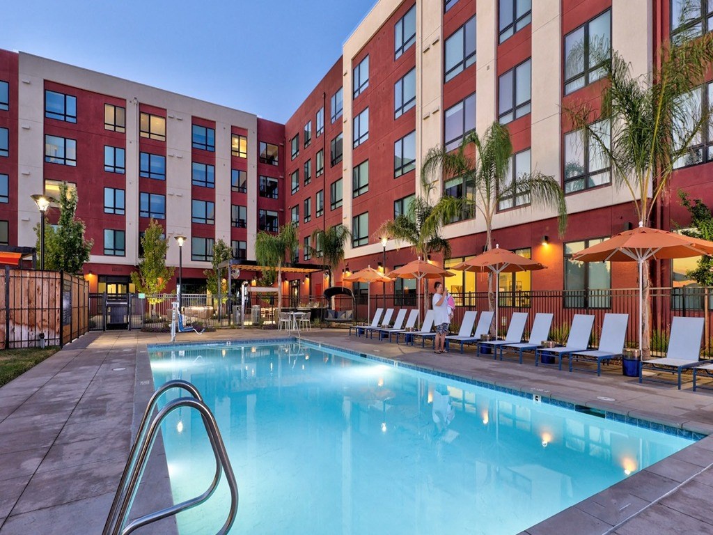 a swimming pool at a hotel with a large pool