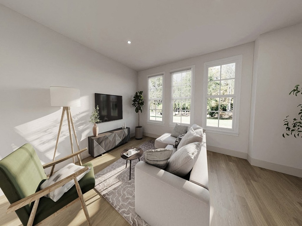 a living room with a couch and a tv