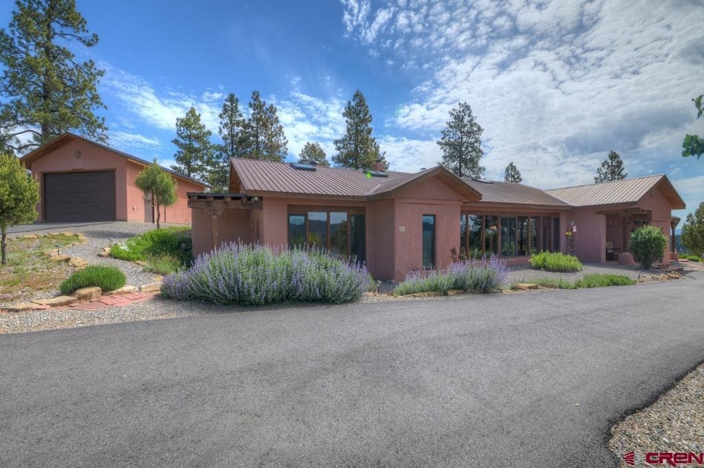 a house with a road in front of it