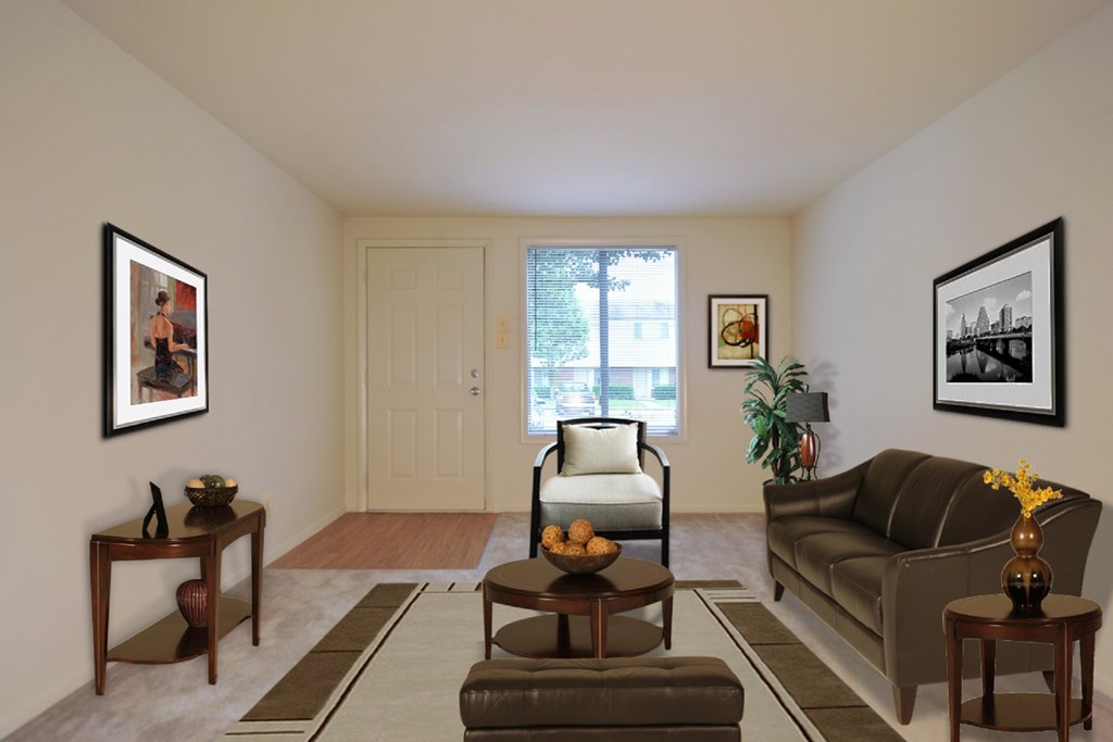 a living room with a couch and a chair