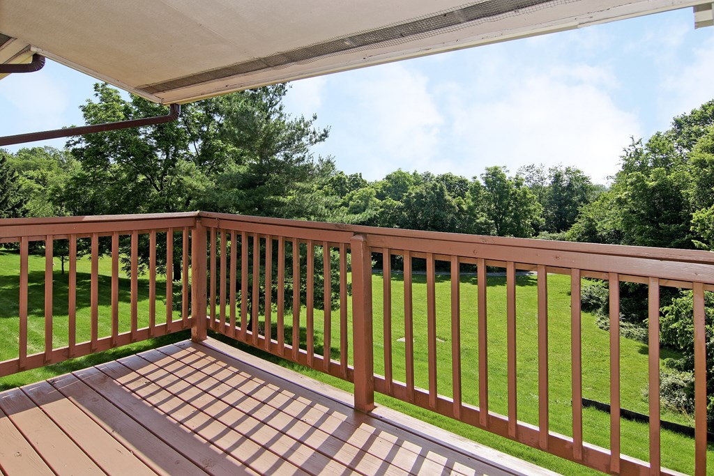 a view of the yard from the deck of a rental home