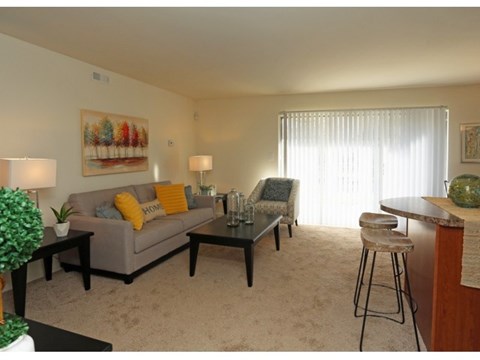 a living room with a couch and a table