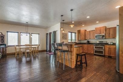 a large kitchen and dining area with a table and chairs
