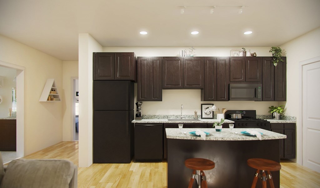 A kitchen with dark brown cabinets and a white counter top.
