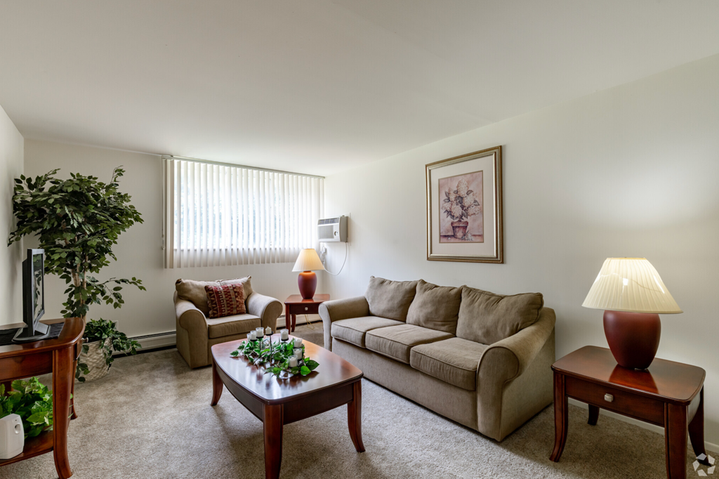 a living room with a couch and a table