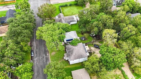 A residential area with houses and trees.