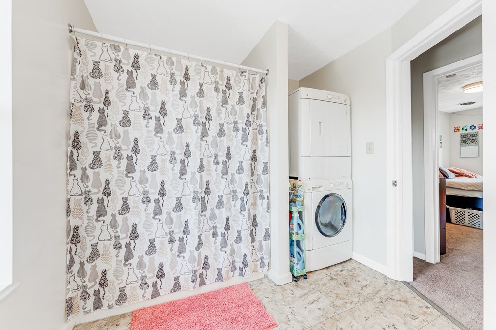 A laundry room with a washer and dryer.