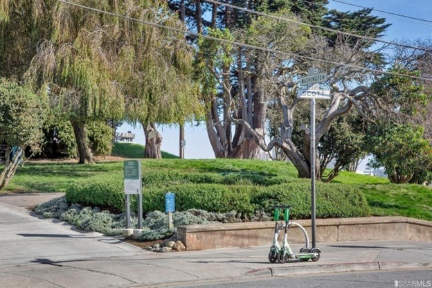 A street sign for Cortez is visible in the distance.