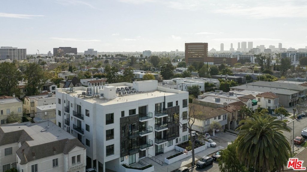 a view of the city from the roof of a building