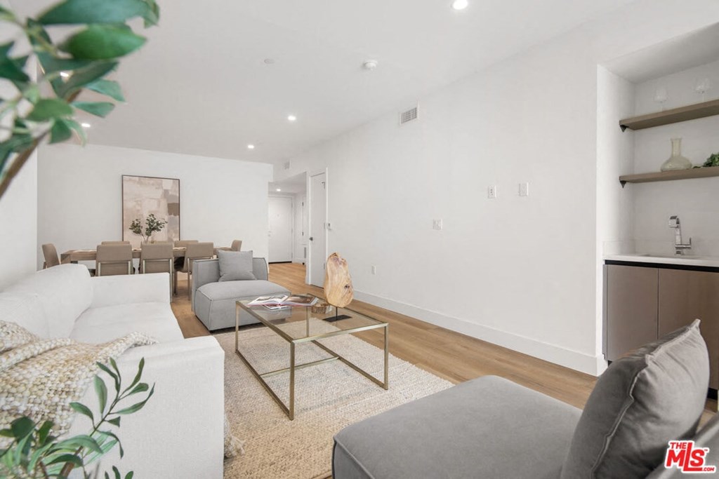 a living room with a couch and a table