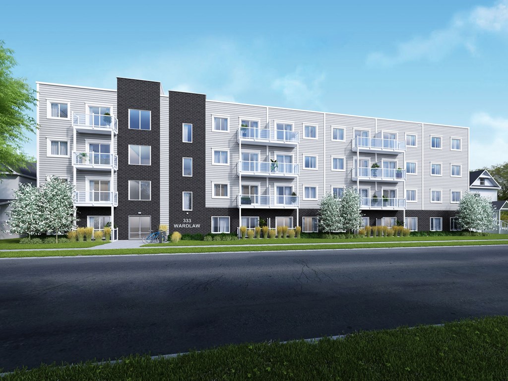 A modern apartment building with the name "Wardlaw" on the front.