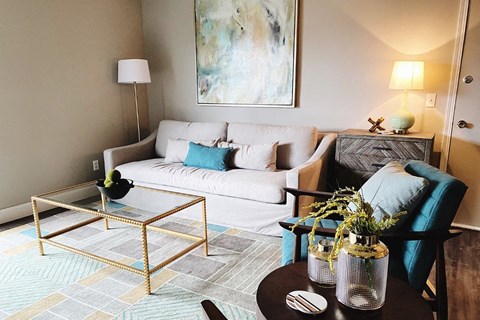 a living room with a couch and a coffee table