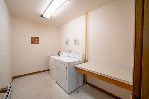 A bathroom with a sink and a toilet.