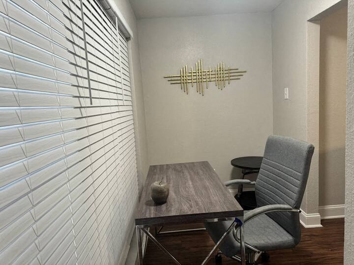 a small room with a table and a chair