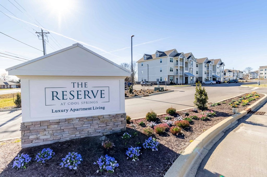 the reserve at cool springs sign on the side of a street