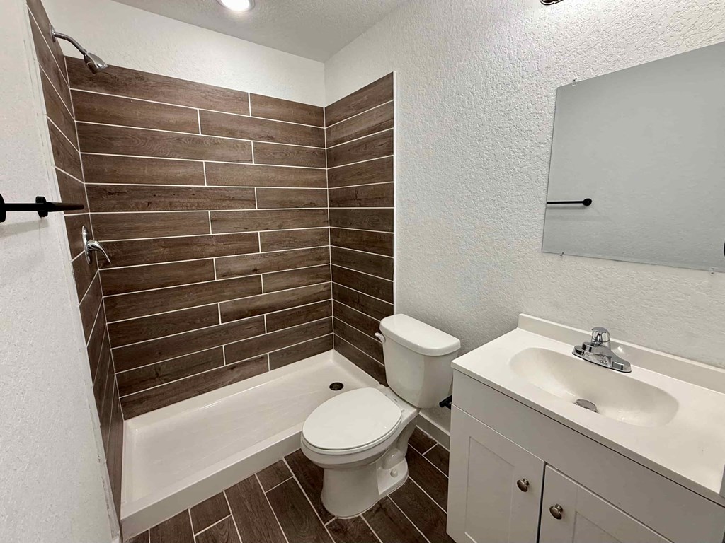 a bathroom with a toilet and a sink