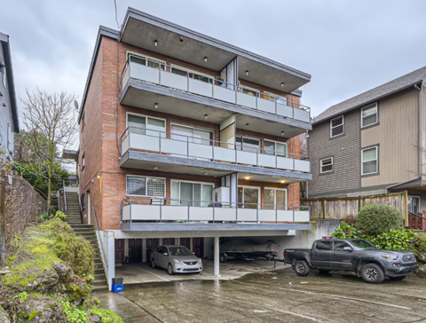 the apartment has a balcony and a parking lot