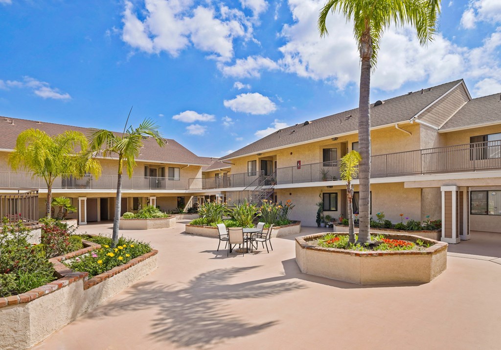 A sunny day at the courtyard of a residential building.