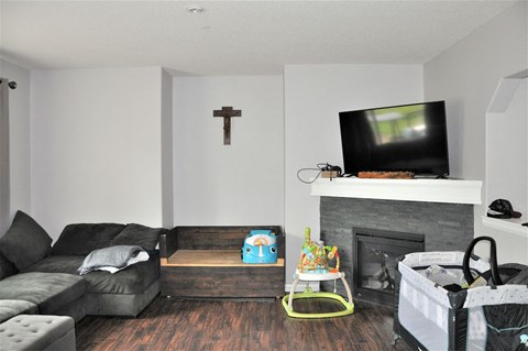 a living room with a couch and a television