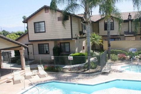A house with a pool in the backyard.