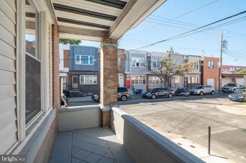 a view of the street from the front of a building