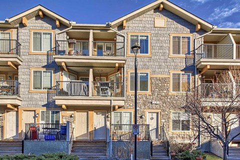 A large building with multiple balconies and windows.