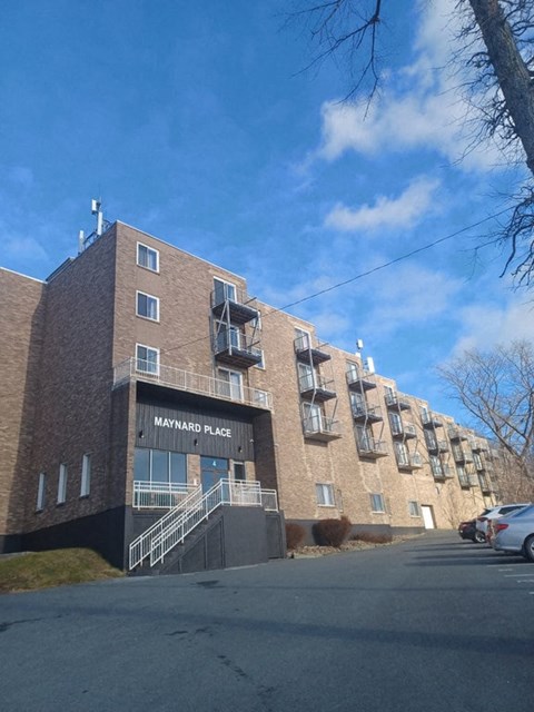 A building with the name Maynard Place on it.