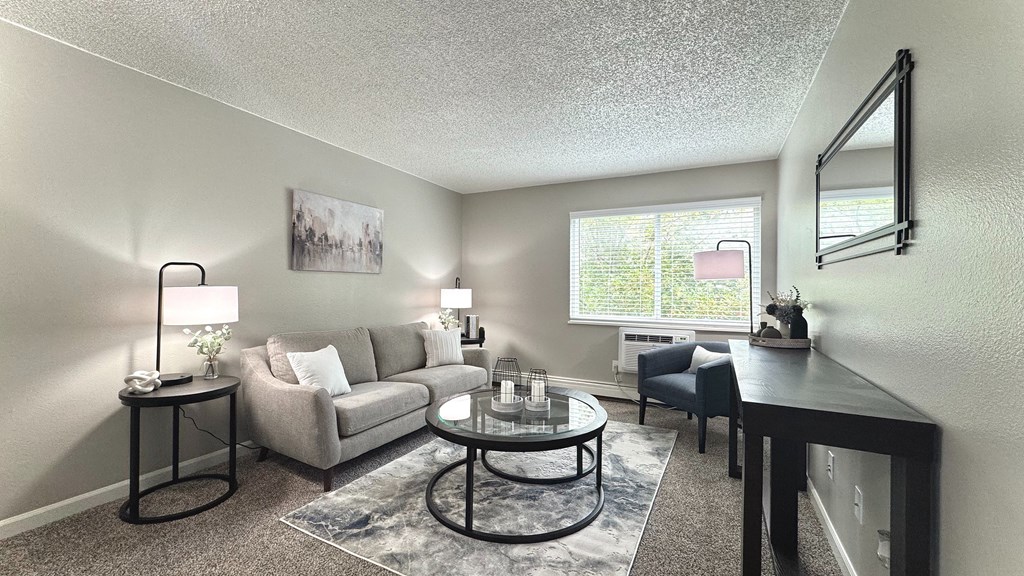 a bathroom with a toilet and a sink and a shower