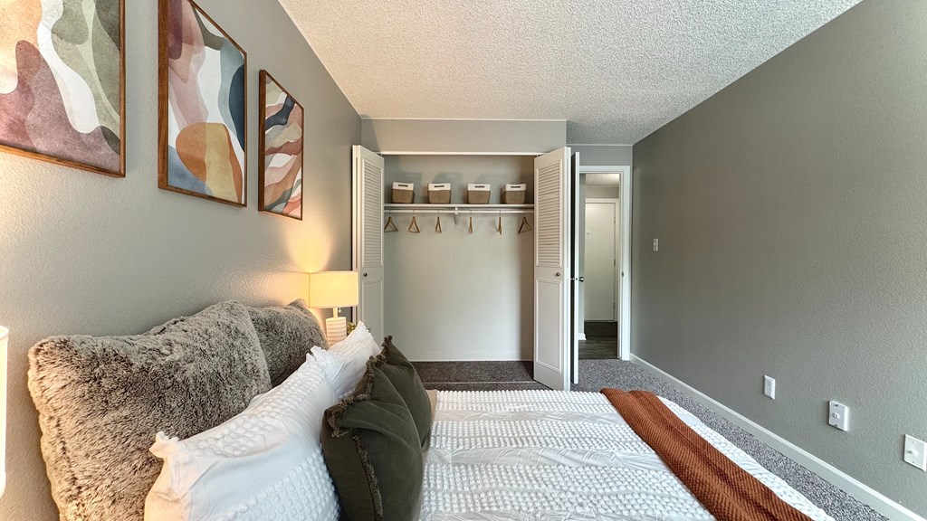 our apartments have a swimming pool with chairs and umbrellas