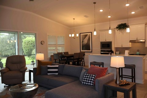 a living room with a couch and a table