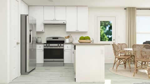 a white kitchen with a table and chairs and a refrigerator