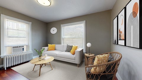 a living room with a couch and a chair