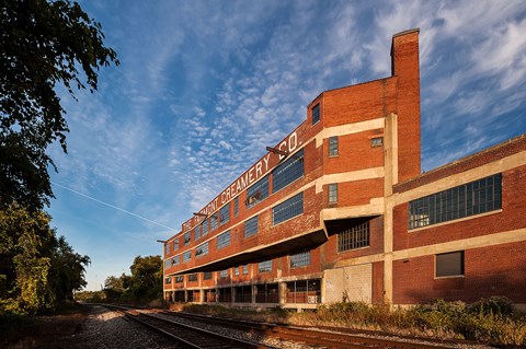 A red brick building with the words "BREAKFAST GREENE" on the side.