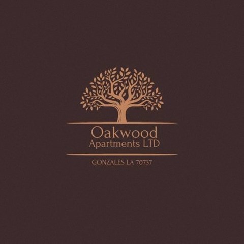 a logo for an apartment building with a tree