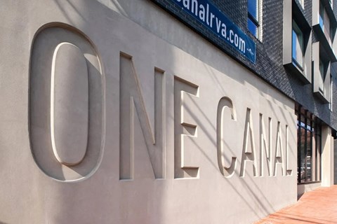 a large sign on the side of a building spelling out the name of a city