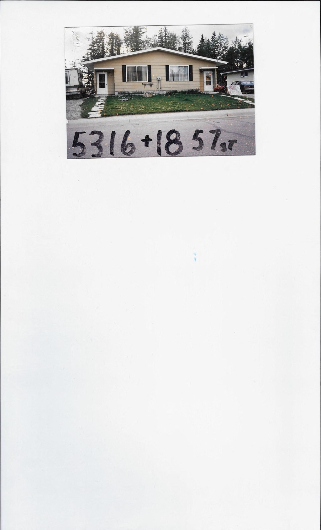 A house with the numbers 5316+857r written on it.