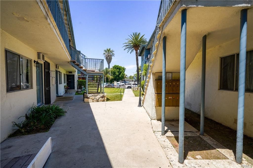 A sunny day at the beachfront with a clear blue sky.