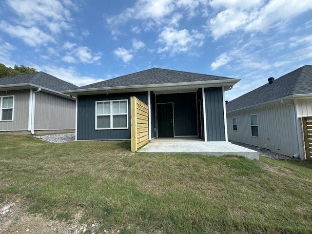 a blue house with a porch and a door open