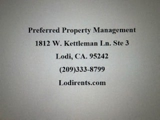A piece of paper with preferred property management information printed on it.