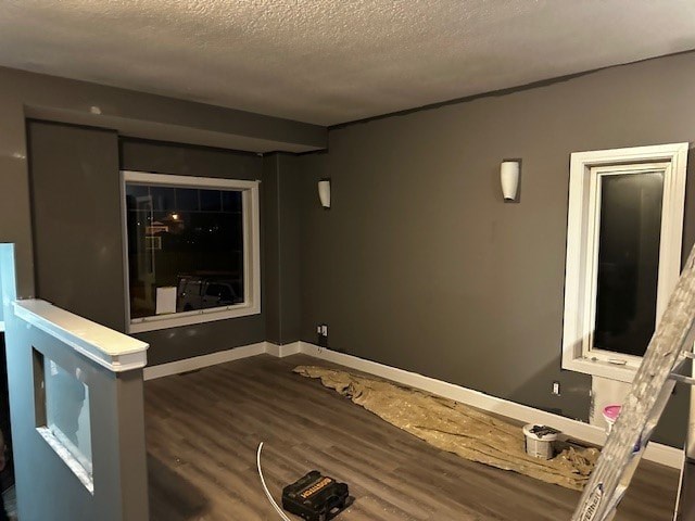 A room with a window and a door is under construction.