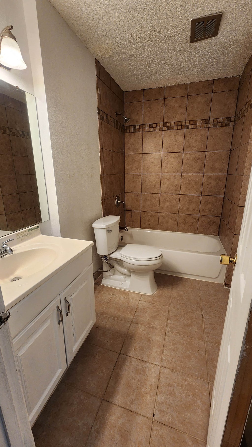 a bathroom with a toilet and a sink