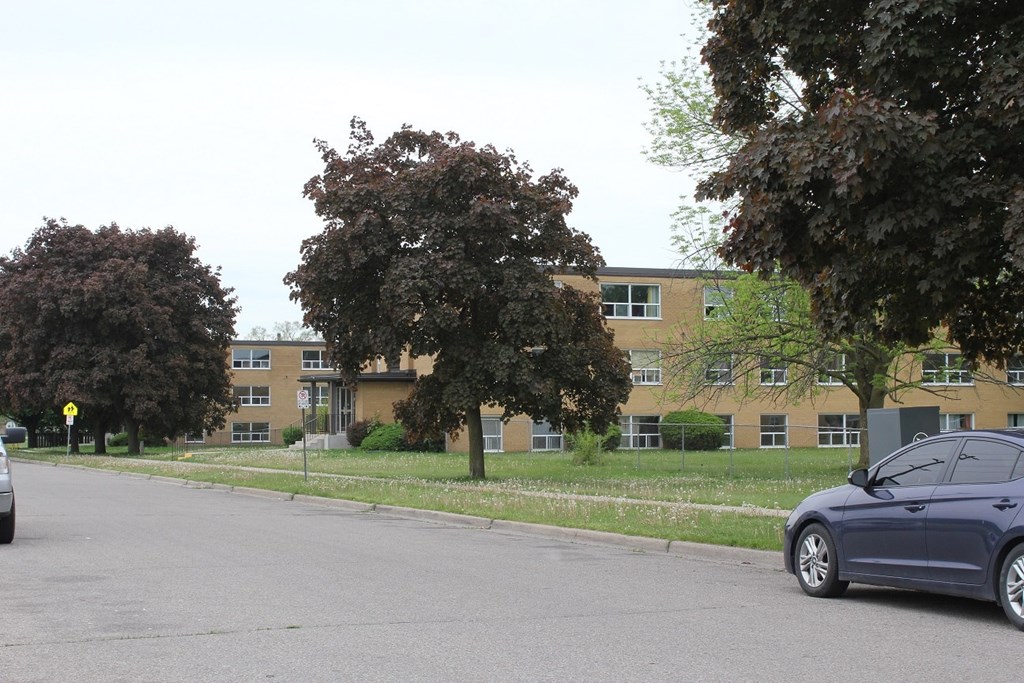 A car is parked on the side of a street.
