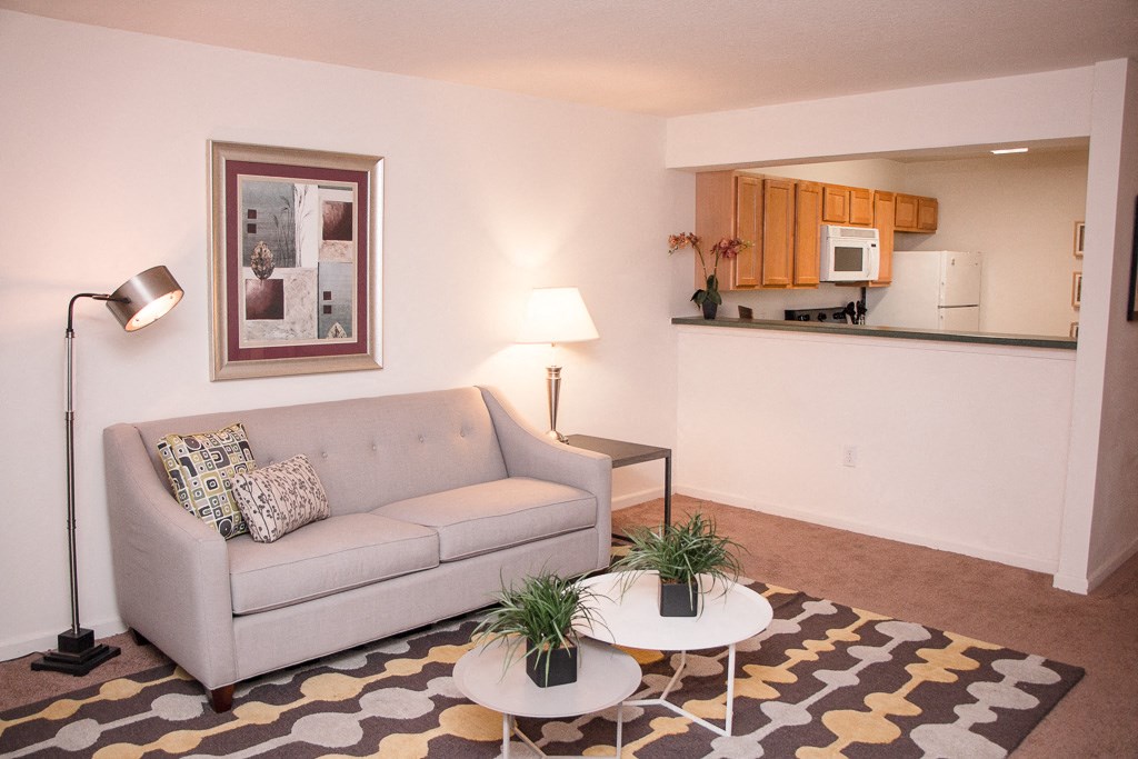 a living room with a couch and a coffee table