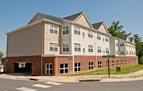 a building with a street sign in front of it