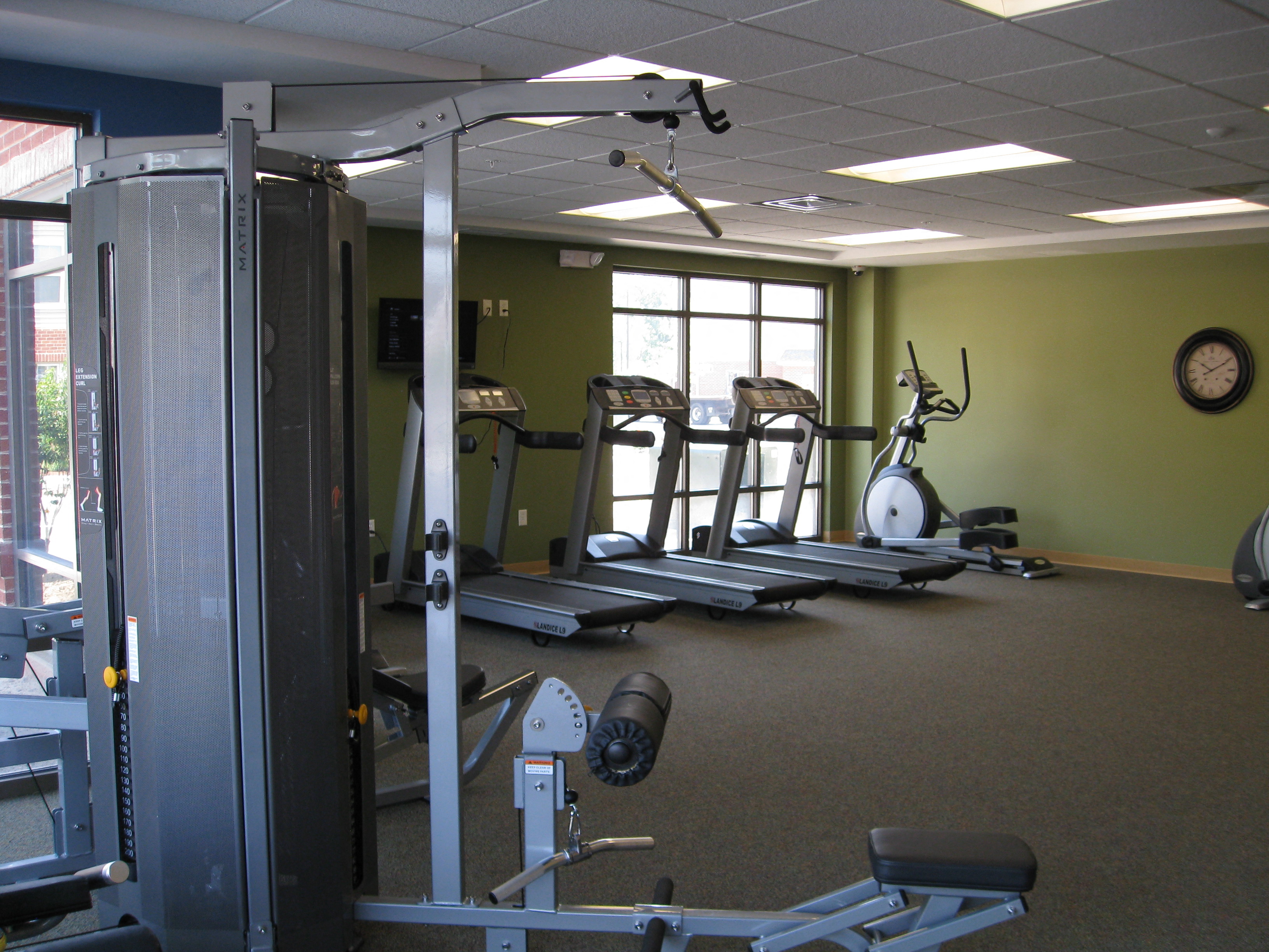 a gym with weights and other exercise equipment